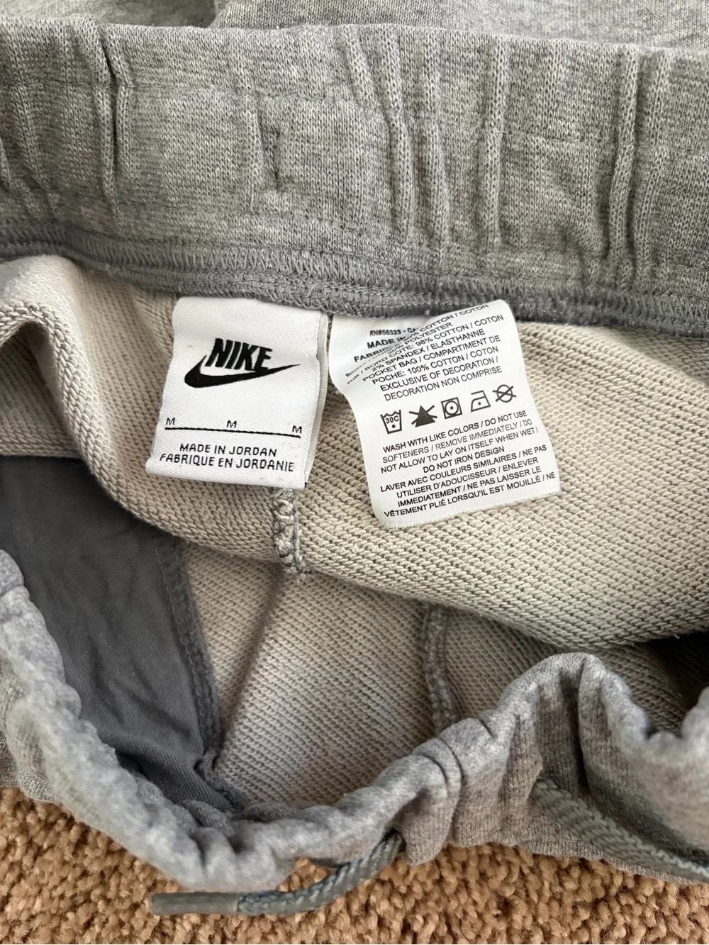Nike Gray Athletic Shorts with White Logo